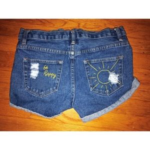 DISTRESSED HIGHWAISTED HAND EMBROIDERED SHORTS